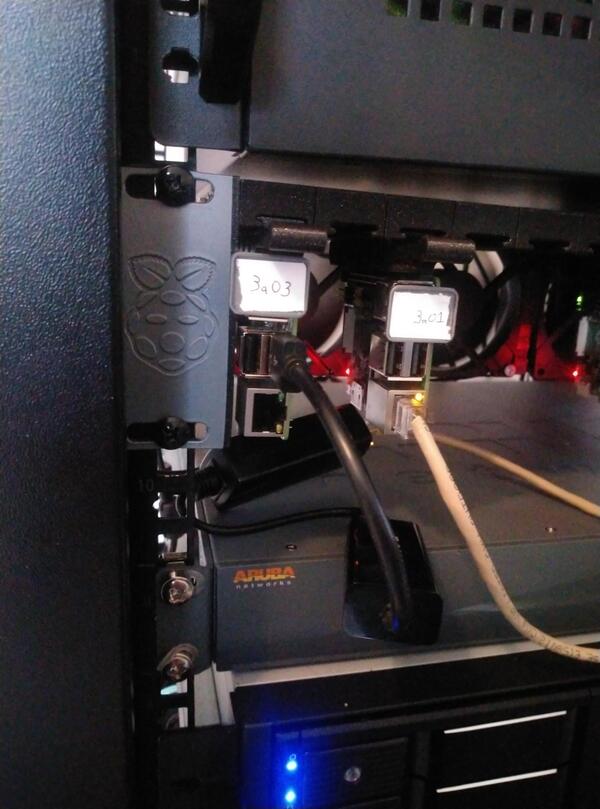 Two Raspberry Pis on the Left Side of a 3D Printed Pi Rack with the Labels 3a03 and 3a01