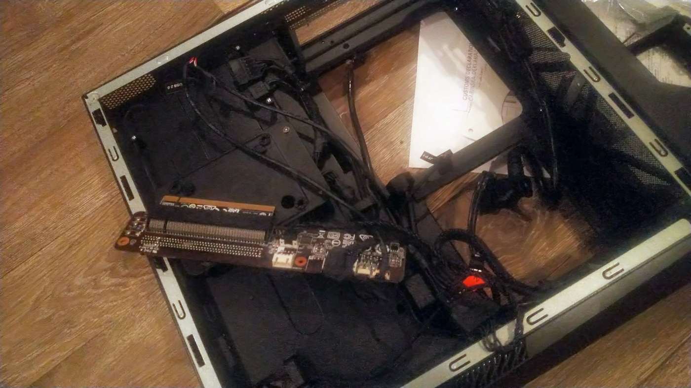 Disassembled MSI Trident X Case and PCI-E Riser