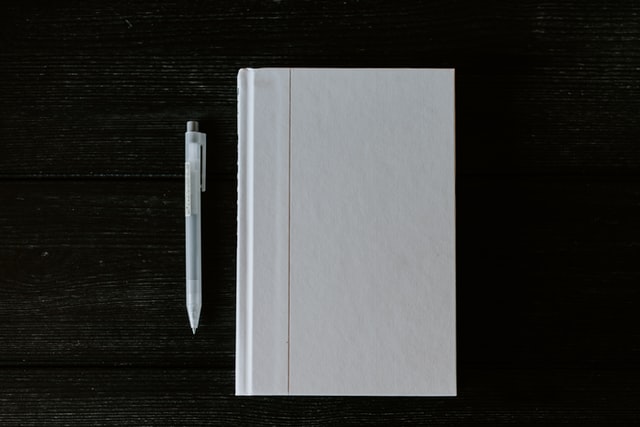 White book and pen